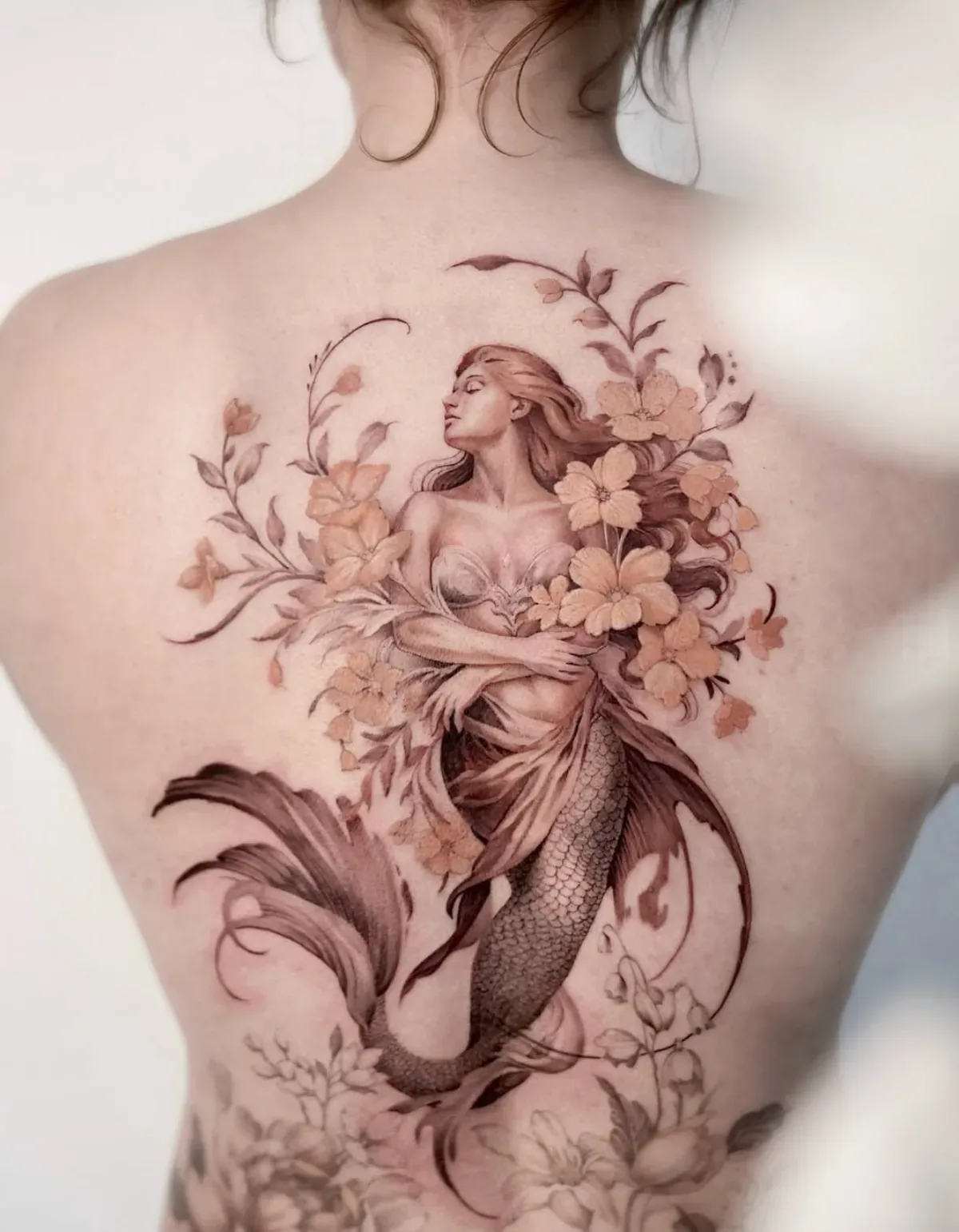 Meerjungfrau und Blüten, Tattoo von Annlie