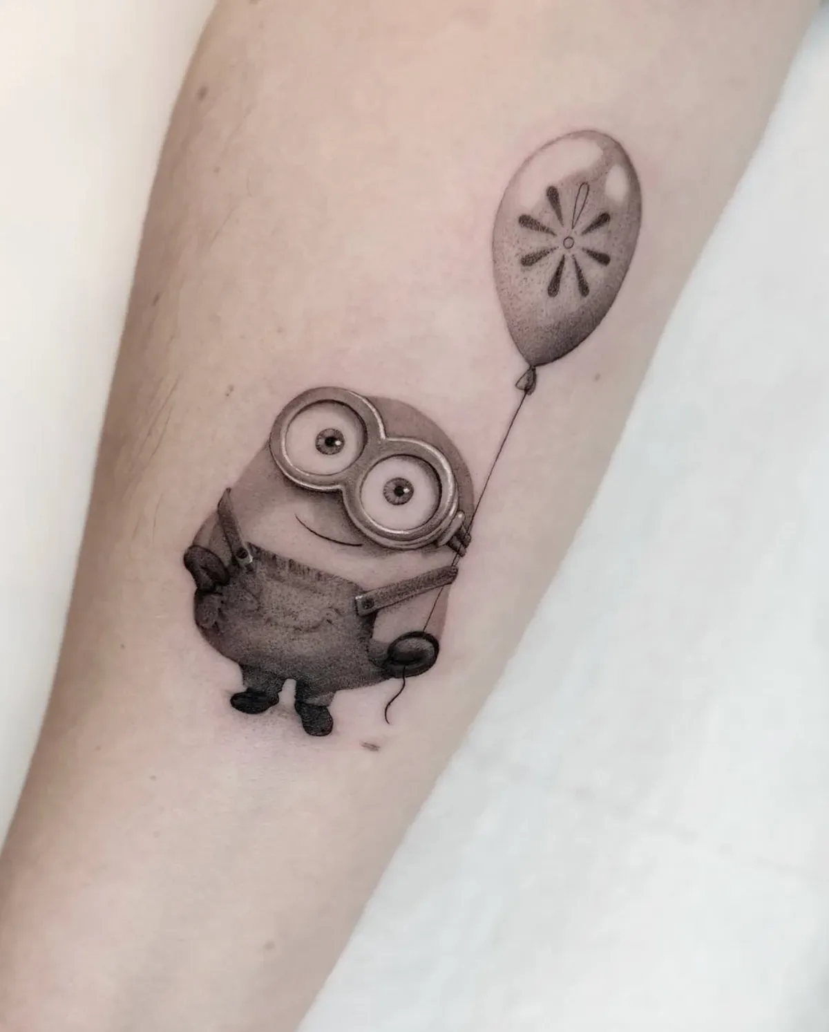 Kleine Figur mit Ballon, Tattoo von Annlie